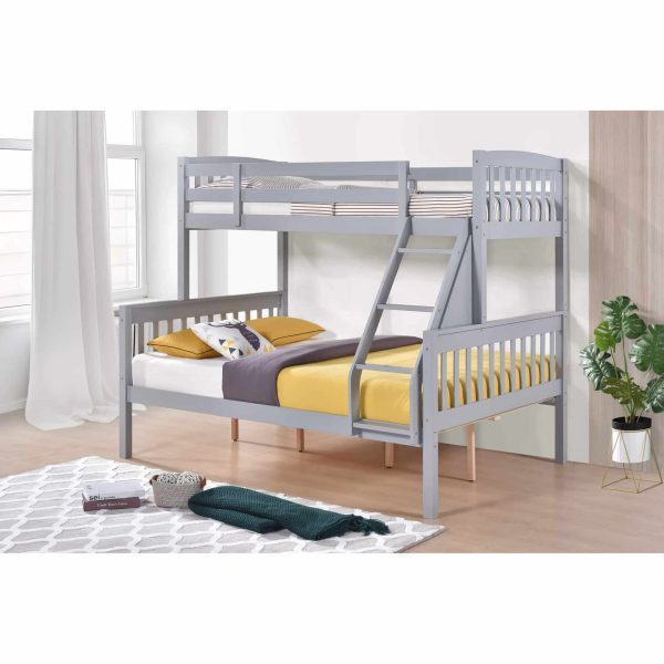 Grey solid wood triple bunk bed with top single bed and bottom double bed, featuring a ladder, yellow and grey bedding, and decorative items in a well-lit room.